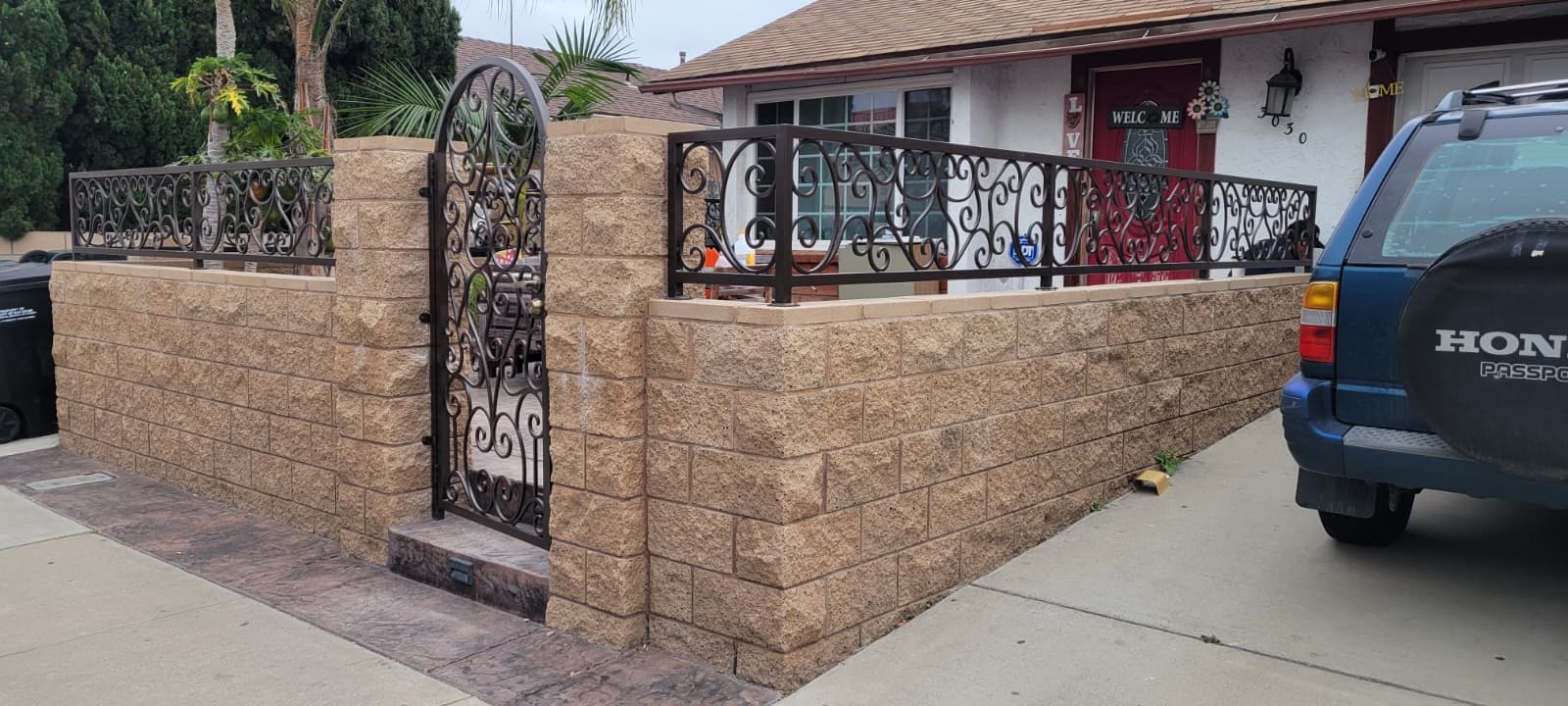 Ornamental fence and arched gate