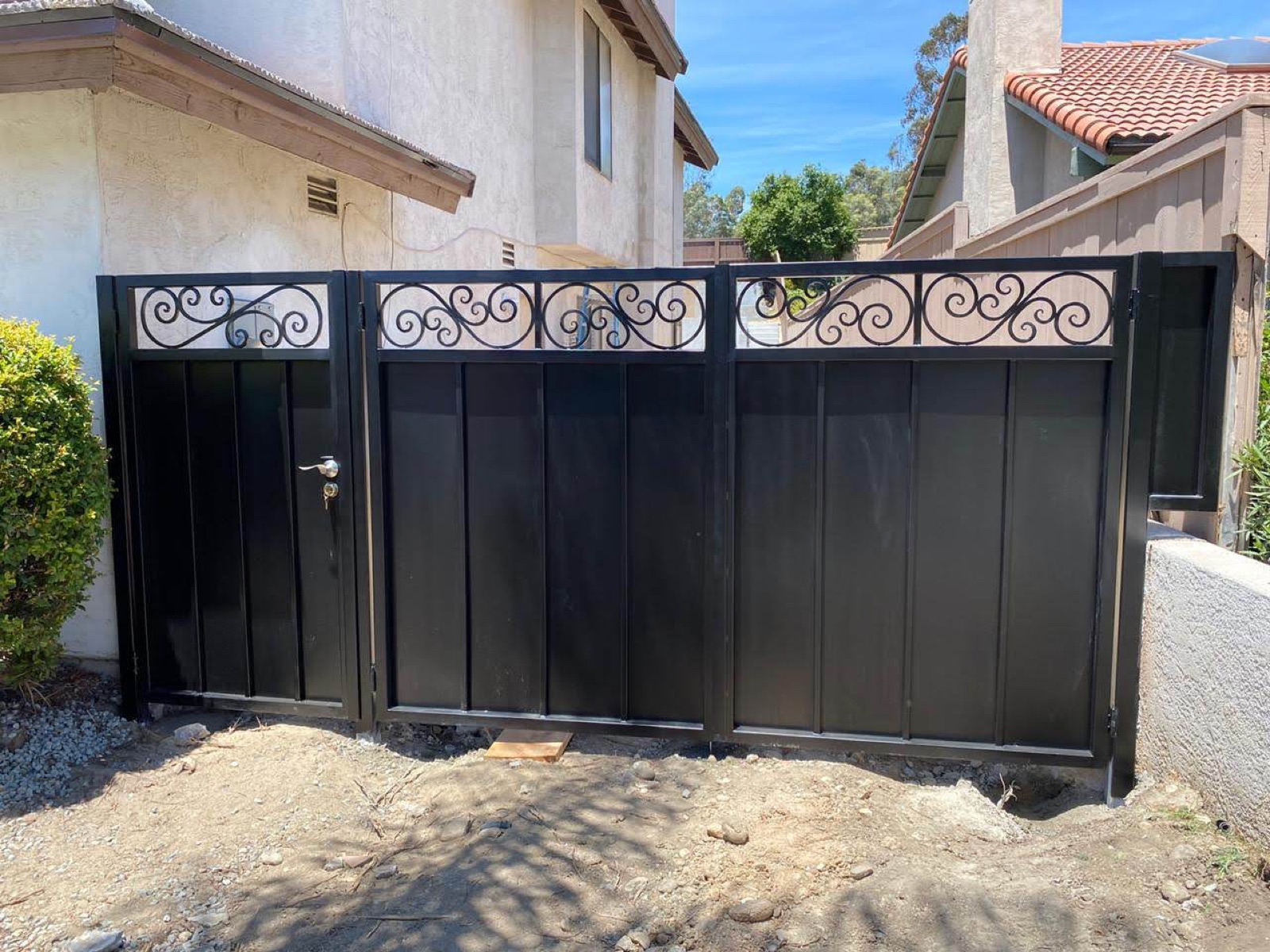Black metal privacy fence and gate